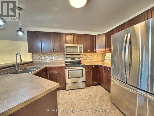 2427 Yellowbirch Court, London, ON - Indoor Photo Showing Kitchen With Double Sink