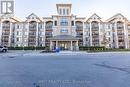 304 - 1450 Main Street E, Milton, ON  - Outdoor With Balcony With Facade 