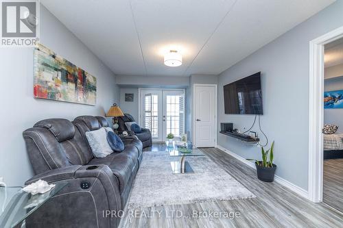 304 - 1450 Main Street E, Milton, ON - Indoor Photo Showing Living Room