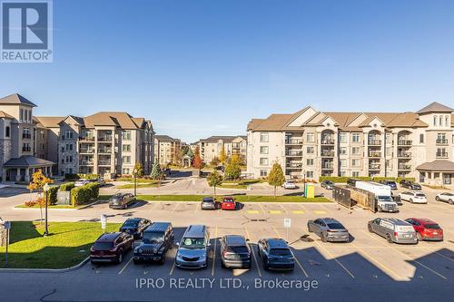 304 - 1450 Main Street E, Milton, ON - Outdoor With Facade