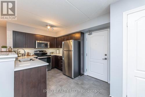 304 - 1450 Main Street E, Milton, ON - Indoor Photo Showing Kitchen With Stainless Steel Kitchen