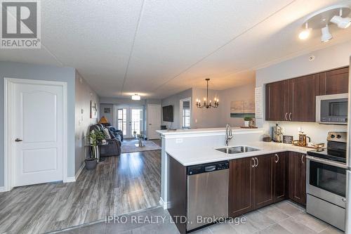 304 - 1450 Main Street E, Milton, ON - Indoor Photo Showing Kitchen With Stainless Steel Kitchen