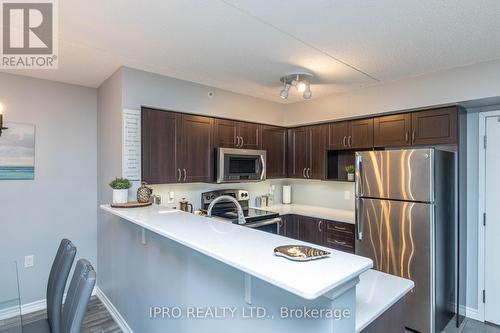 304 - 1450 Main Street E, Milton, ON - Indoor Photo Showing Kitchen With Stainless Steel Kitchen