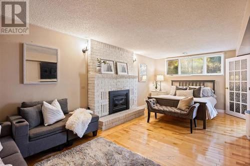 12 Portal Court, Hamilton, ON - Indoor Photo Showing Living Room With Fireplace