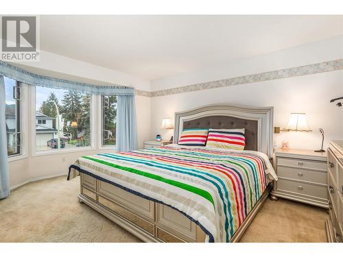 Master Bedroom with Ensuite - 1730 Simpson Court, Kelowna, BC - Indoor Photo Showing Bedroom