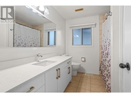 Main Bathroom with Bathtub - 1730 Simpson Court, Kelowna, BC - Indoor Photo Showing Bathroom