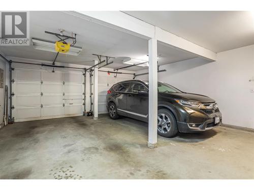 Double Garage - 1730 Simpson Court, Kelowna, BC - Indoor Photo Showing Garage