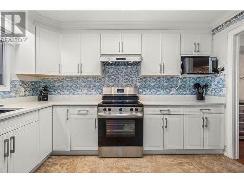 Main Kitchen - 1730 Simpson Court, Kelowna, BC - Indoor Photo Showing Kitchen With Upgraded Kitchen