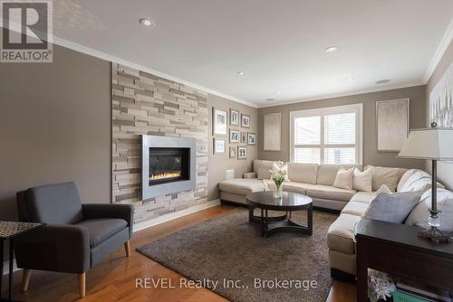 13 Chessington Street, St. Catharines (453 - Grapeview), ON - Indoor Photo Showing Living Room With Fireplace