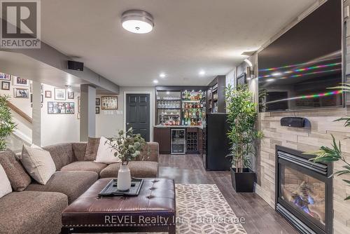 13 Chessington Street, St. Catharines (453 - Grapeview), ON - Indoor Photo Showing Living Room With Fireplace