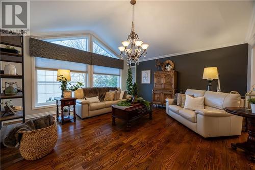 warm and welcoming living room with vault - 68 Beaver Creek Trail, Pembroke, ON - Indoor Photo Showing Living Room