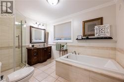 main bath with soaker tub and separate shower - 