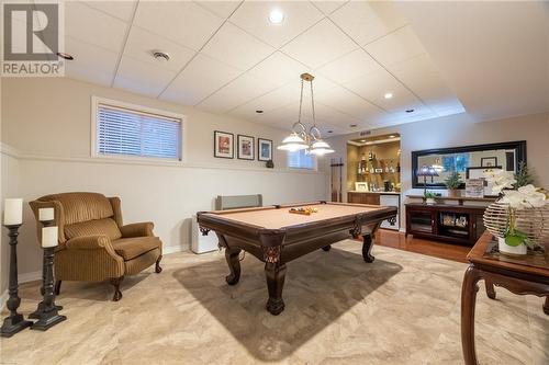 family room featuring large windows - 68 Beaver Creek Trail, Pembroke, ON - Indoor Photo Showing Other Room