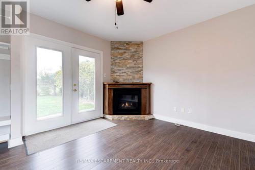 232 East 8Th Street, Hamilton, ON - Indoor Photo Showing Living Room With Fireplace