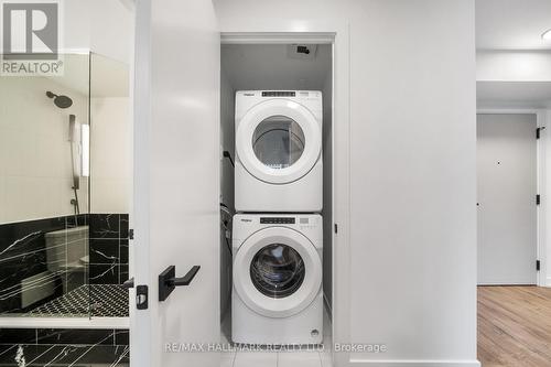 608 - 327 King Street W, Toronto, ON - Indoor Photo Showing Laundry Room