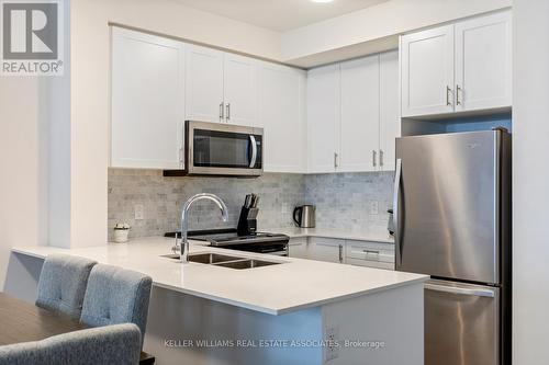 507 - 657 Cricklewood Drive, Mississauga, ON - Indoor Photo Showing Kitchen With Stainless Steel Kitchen With Double Sink With Upgraded Kitchen