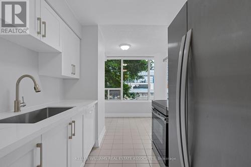 208 - 330 Rathburn Road W, Mississauga, ON - Indoor Photo Showing Kitchen