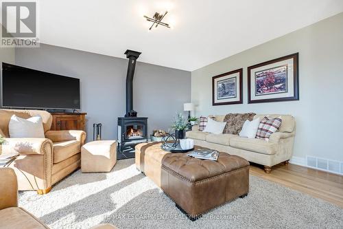 13416 Fourth Line Nassagaweya, Milton, ON - Indoor Photo Showing Living Room With Fireplace