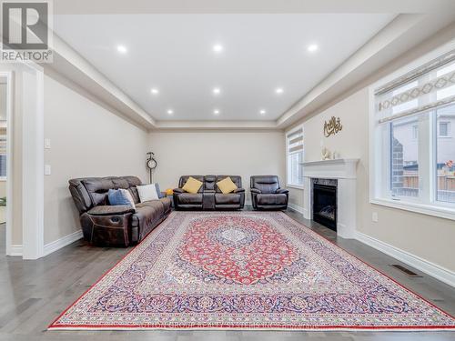 1527 Mendelson Heights, Milton, ON - Indoor Photo Showing Living Room With Fireplace