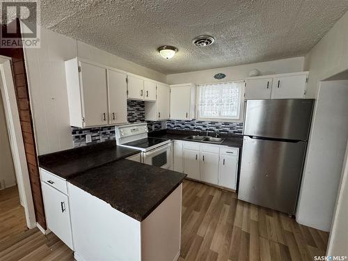 209 5Th Avenue W, Shellbrook, SK - Indoor Photo Showing Kitchen With Double Sink