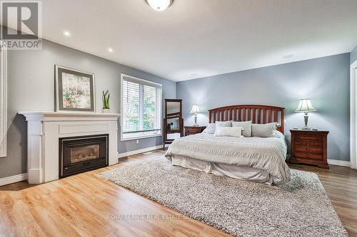 2134 Berryman Court, Burlington, ON - Indoor Photo Showing Bedroom With Fireplace