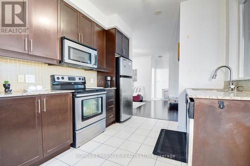 3303 - 80 Absolute Avenue, Mississauga, ON - Indoor Photo Showing Kitchen With Upgraded Kitchen