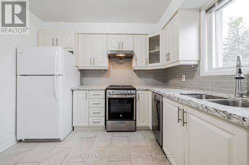 1074 Lawrence Avenue E, Toronto, ON - Indoor Photo Showing Kitchen With Double Sink