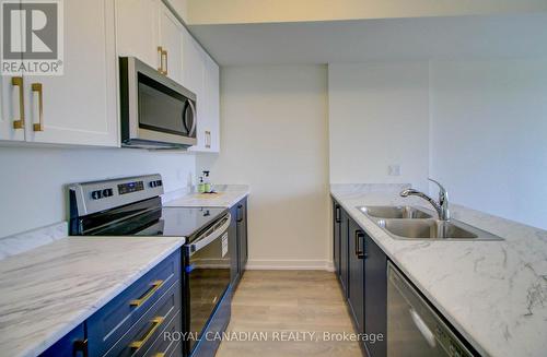 1701 - 160 Densmore Road N, Cobourg, ON - Indoor Photo Showing Kitchen With Stainless Steel Kitchen With Double Sink