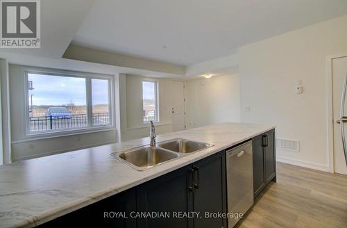 1701 - 160 Densmore Road N, Cobourg, ON - Indoor Photo Showing Kitchen With Double Sink