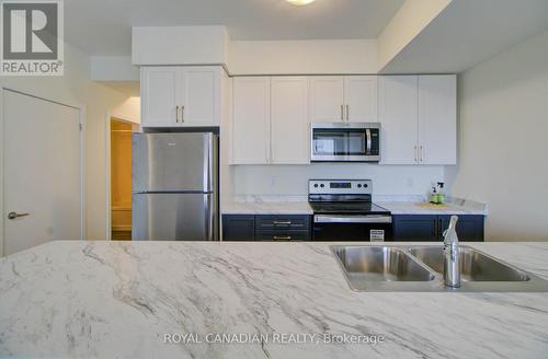 1701 - 160 Densmore Road N, Cobourg, ON - Indoor Photo Showing Kitchen With Stainless Steel Kitchen With Double Sink