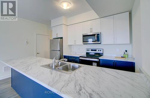 1701 - 160 Densmore Road N, Cobourg, ON - Indoor Photo Showing Kitchen With Stainless Steel Kitchen With Double Sink With Upgraded Kitchen