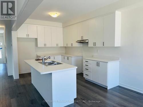 56 Gauley Drive, Centre Wellington, ON - Indoor Photo Showing Kitchen With Double Sink