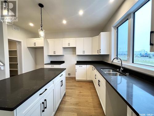 10 Aspen Place, Humboldt, SK - Indoor Photo Showing Kitchen With Double Sink