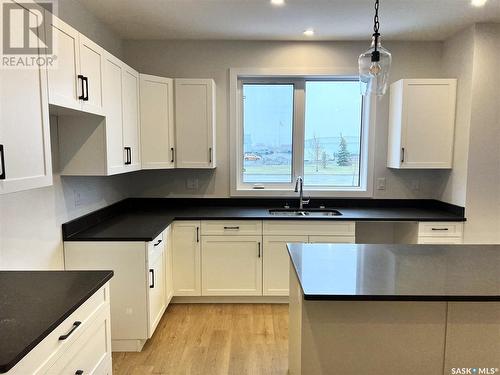 10 Aspen Place, Humboldt, SK - Indoor Photo Showing Kitchen With Double Sink