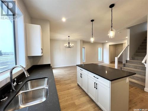 10 Aspen Place, Humboldt, SK - Indoor Photo Showing Kitchen With Double Sink