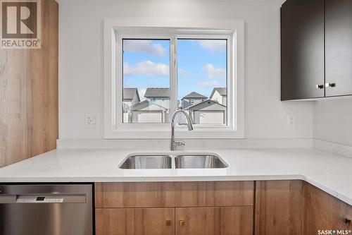 666 Mcormond Drive, Saskatoon, SK - Indoor Photo Showing Kitchen With Double Sink