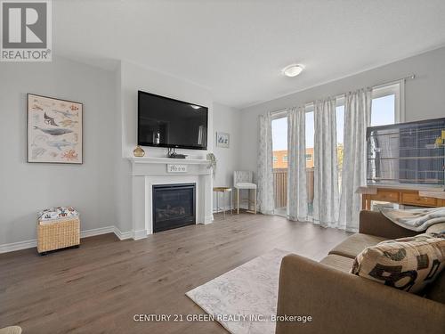 1291 Kovachik Boulevard, Milton, ON - Indoor Photo Showing Living Room With Fireplace