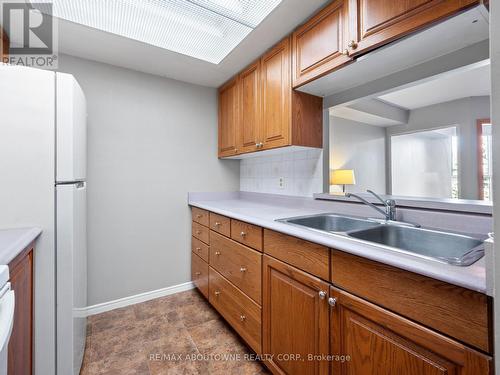 422 - 8351 Mclaughlin Road, Brampton, ON - Indoor Photo Showing Kitchen With Double Sink