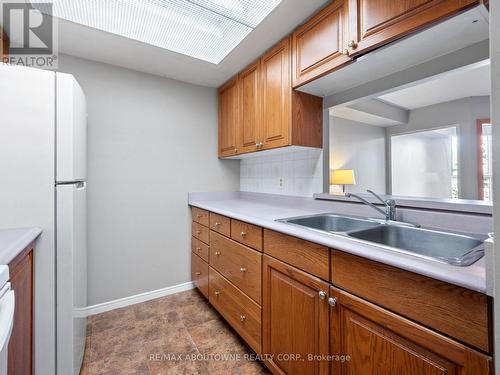 422 - 8351 Mclaughlin Road, Brampton, ON - Indoor Photo Showing Kitchen With Double Sink