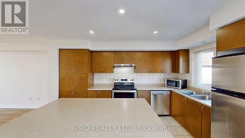 140 - 3050 Erin Centre Boulevard, Mississauga, ON - Indoor Photo Showing Kitchen With Double Sink