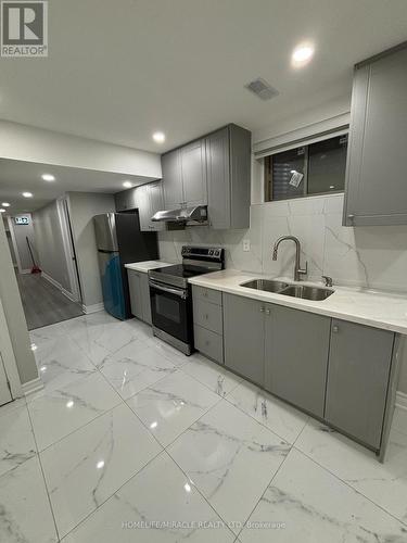 Bsmt - 54 Spinland Street, Caledon, ON - Indoor Photo Showing Kitchen With Double Sink