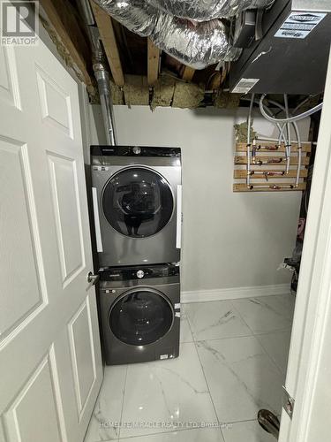 Bsmt - 54 Spinland Street, Caledon, ON - Indoor Photo Showing Laundry Room