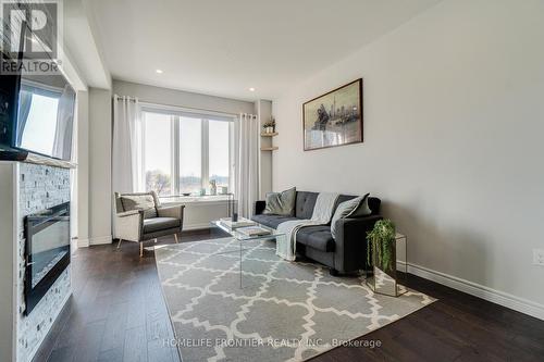 144 Hazelton Avenue, Hamilton, ON - Indoor Photo Showing Living Room With Fireplace