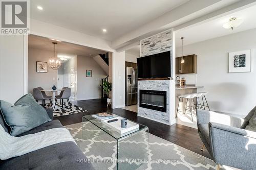 144 Hazelton Avenue, Hamilton, ON - Indoor Photo Showing Living Room With Fireplace