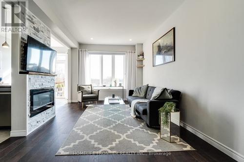 144 Hazelton Avenue, Hamilton, ON - Indoor Photo Showing Living Room With Fireplace