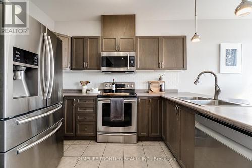 144 Hazelton Avenue, Hamilton, ON - Indoor Photo Showing Kitchen With Double Sink