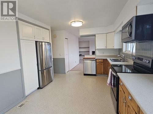 488 Simon Fraser Avenue, Fraser Lake, BC - Indoor Photo Showing Kitchen With Double Sink