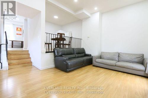 25 - 1121 Sandhurst Circle, Toronto, ON - Indoor Photo Showing Living Room