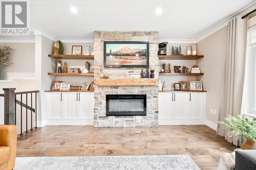 8 Crystalwood Lane, Springwater, ON - Indoor Photo Showing Living Room With Fireplace