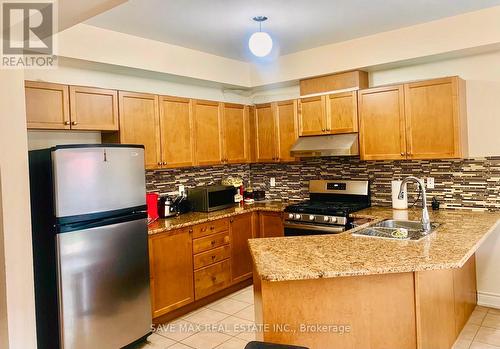 4628 Sandford Farm Drive, Mississauga, ON - Indoor Photo Showing Kitchen With Stainless Steel Kitchen With Double Sink